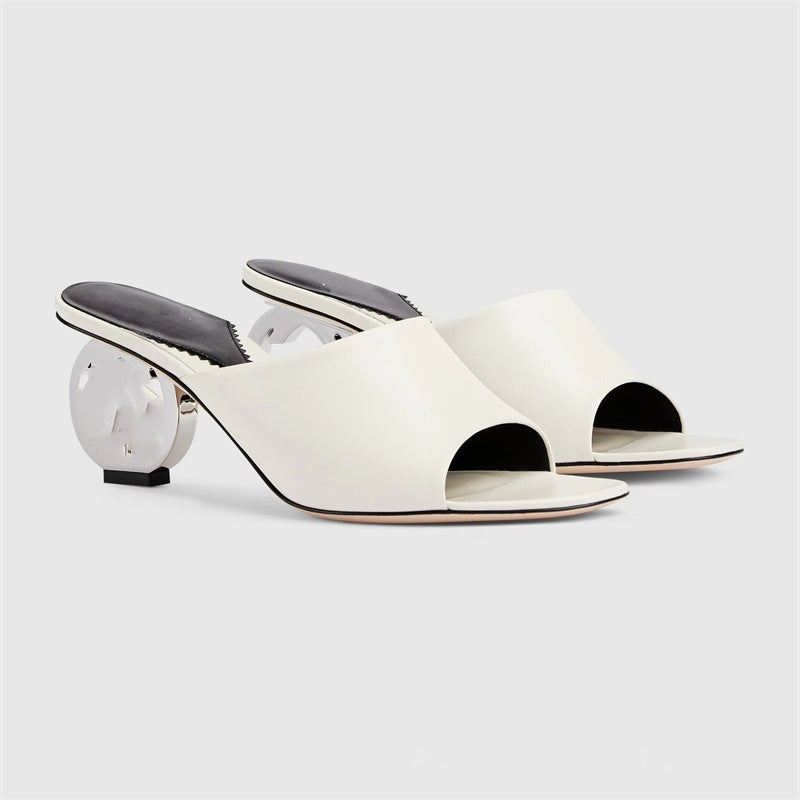 Femme Open-Toe Mules, joissa on veistoksellinen korkosuunnittelu Luvik