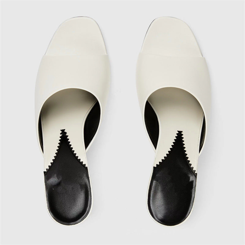 Femme Open-Toe Mules, joissa on veistoksellinen korkosuunnittelu Luvik
