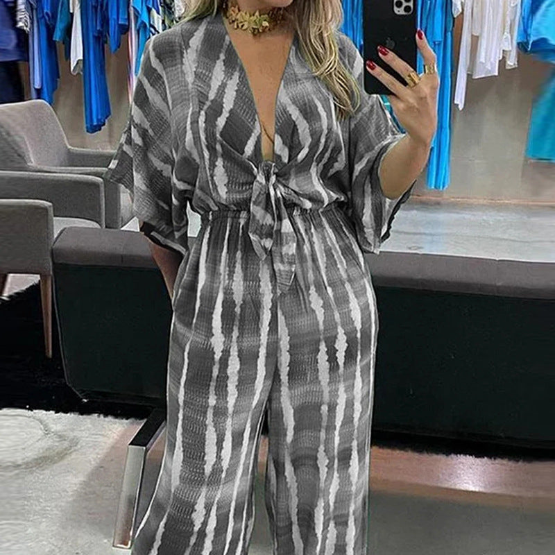 Naisten jumpsuit, jossa on elegantit kimono-hihat ja vyötärölle sidottava vyö Luvik