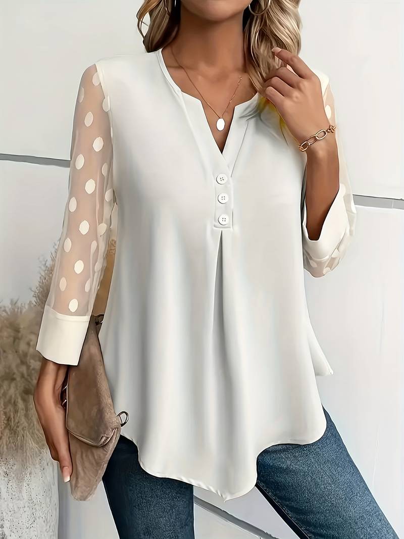 Luvik | Tyylikäs blusa, jossa on V-pääntie ja pilkulliset hihat
