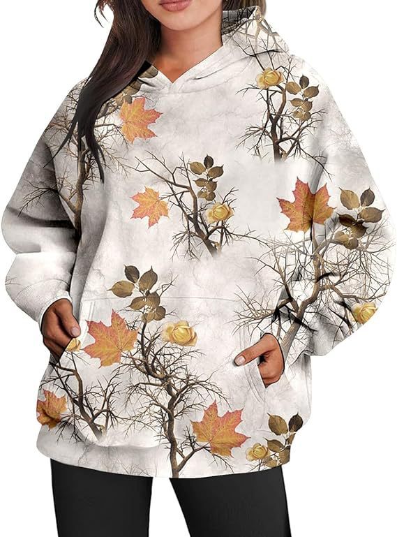 Luvik | Ylikokoinen urheilu-huppari, jossa on camouflage-vaahteralehtiprintti