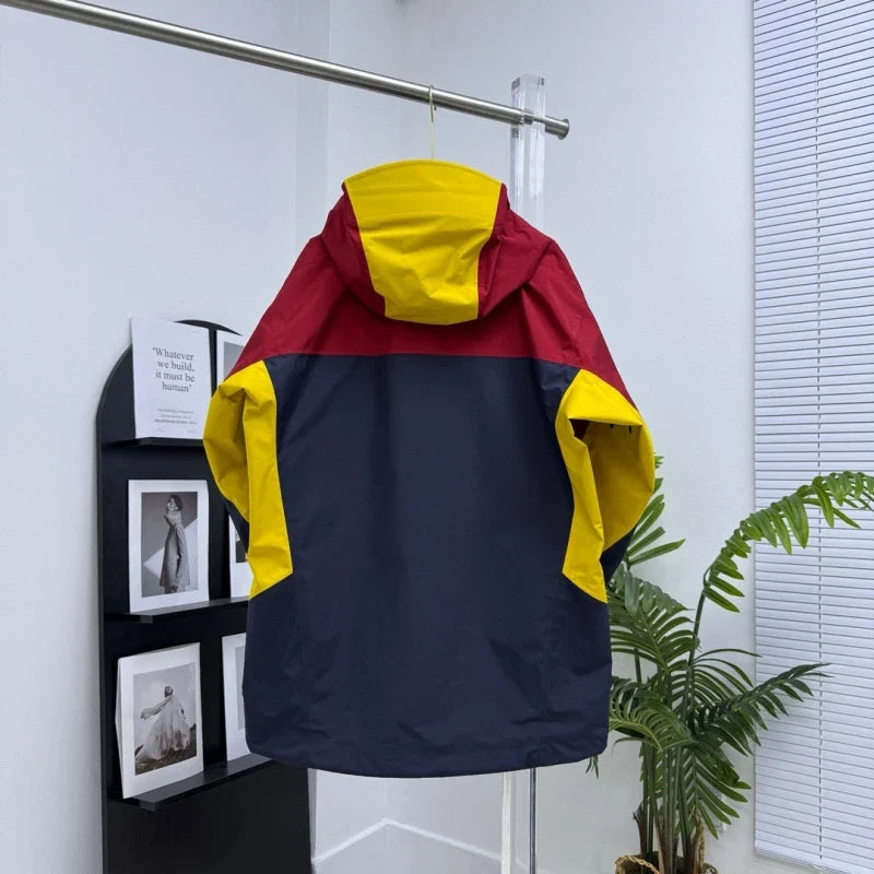 Luvik | Mehrfarbige Wasserdichte Jacke Mit Hohem Kragen Und Kapuze